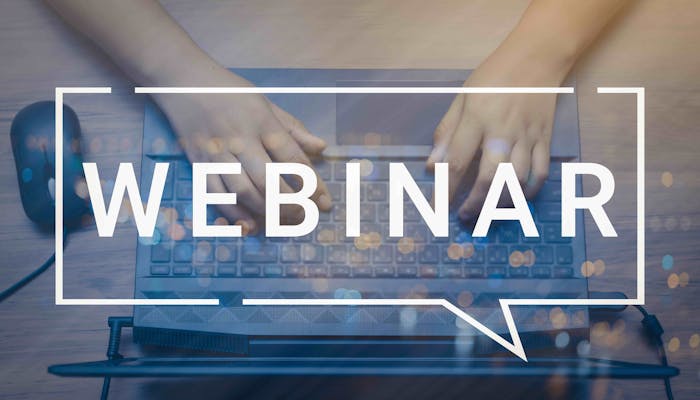 una fotografia di un computer con la scritta sopra webinar